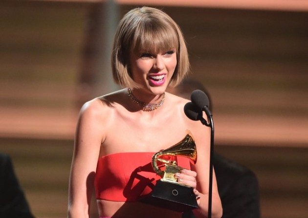 Taylor Swift accepting the award for album of the year.