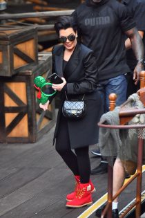 Kris Jenner wore her 'Nice 'boots to Disneyland yesterday for the celebration of grandchild Reign Disick.